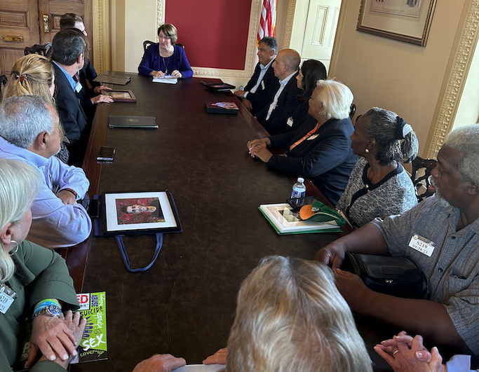 Staff from Clery Center and StopHazing, and parents of children who were killed or seriously injured in hazing incidents meeting with Senator Amy Klobuchar, co-lead sponsor of the Stop Campus Hazing Act in Washington DC, September 2023.